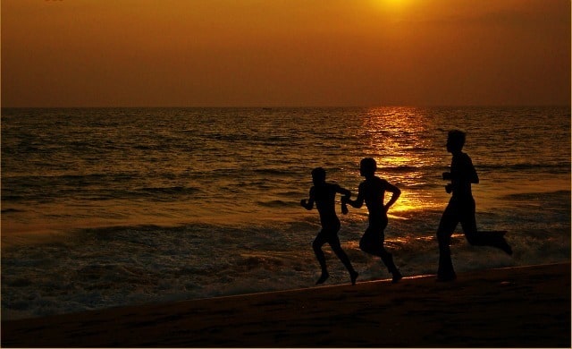 Running along the sea shore