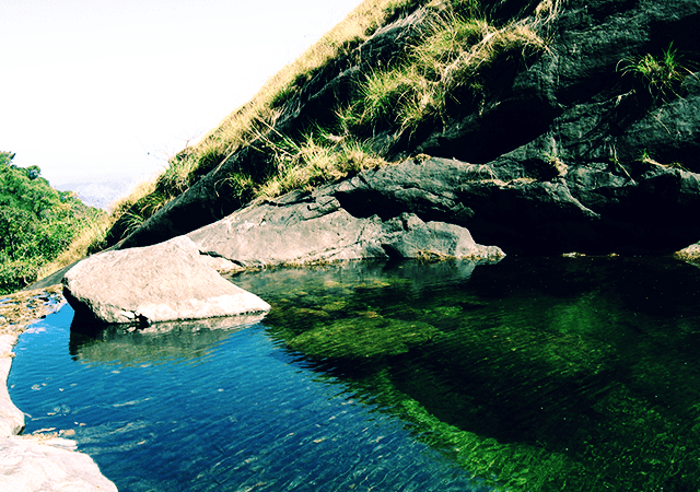 Shallow Water Pool on Top of Olichuchattam Falls