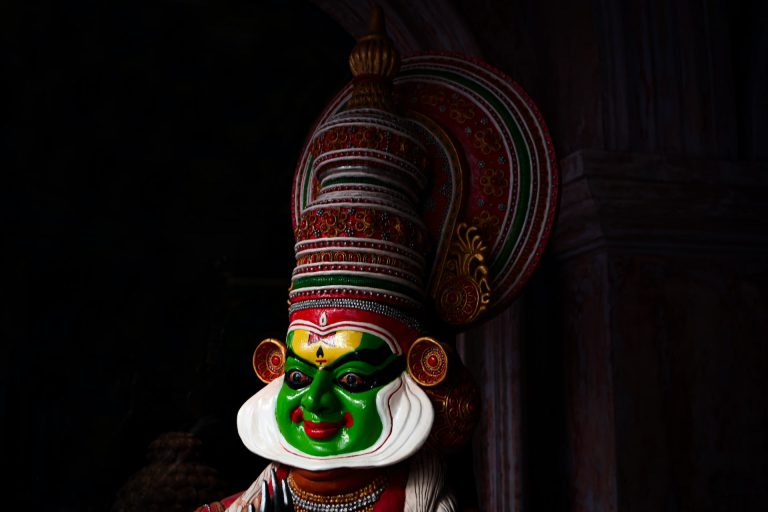 Traditional Kathakali performance included in Kerala tour packages