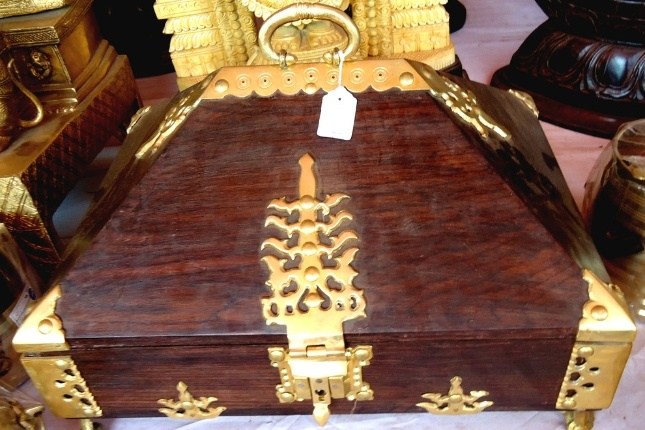 Handcrafted wooden Nettur Petti jewelry box from Kerala, often purchased by Kerala tour packages tourists.