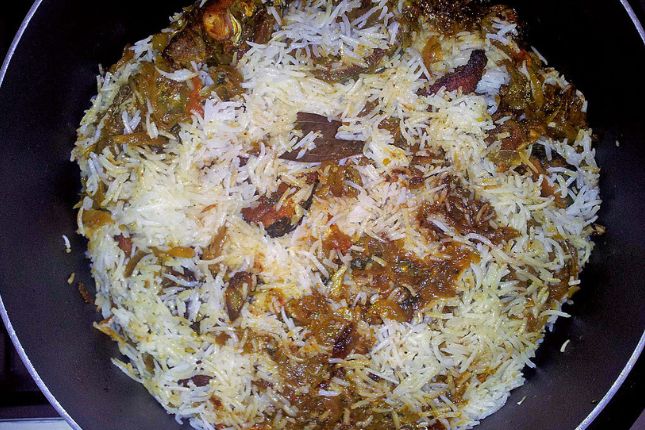 Authentic Malabar Biryani with rice, spices, and chicken – highlight of Kerala food tour packages