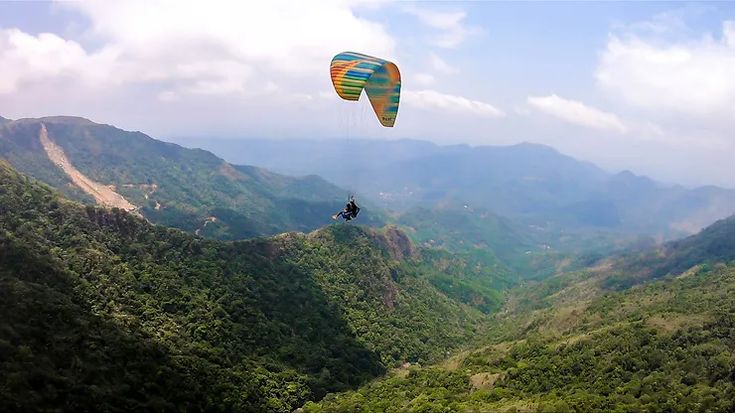 Paragliding in Vagamon during summer adventure activity in Kerala hill station